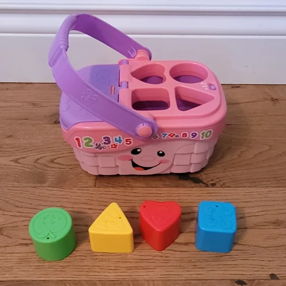 Fisher price shop shape sorter pink
